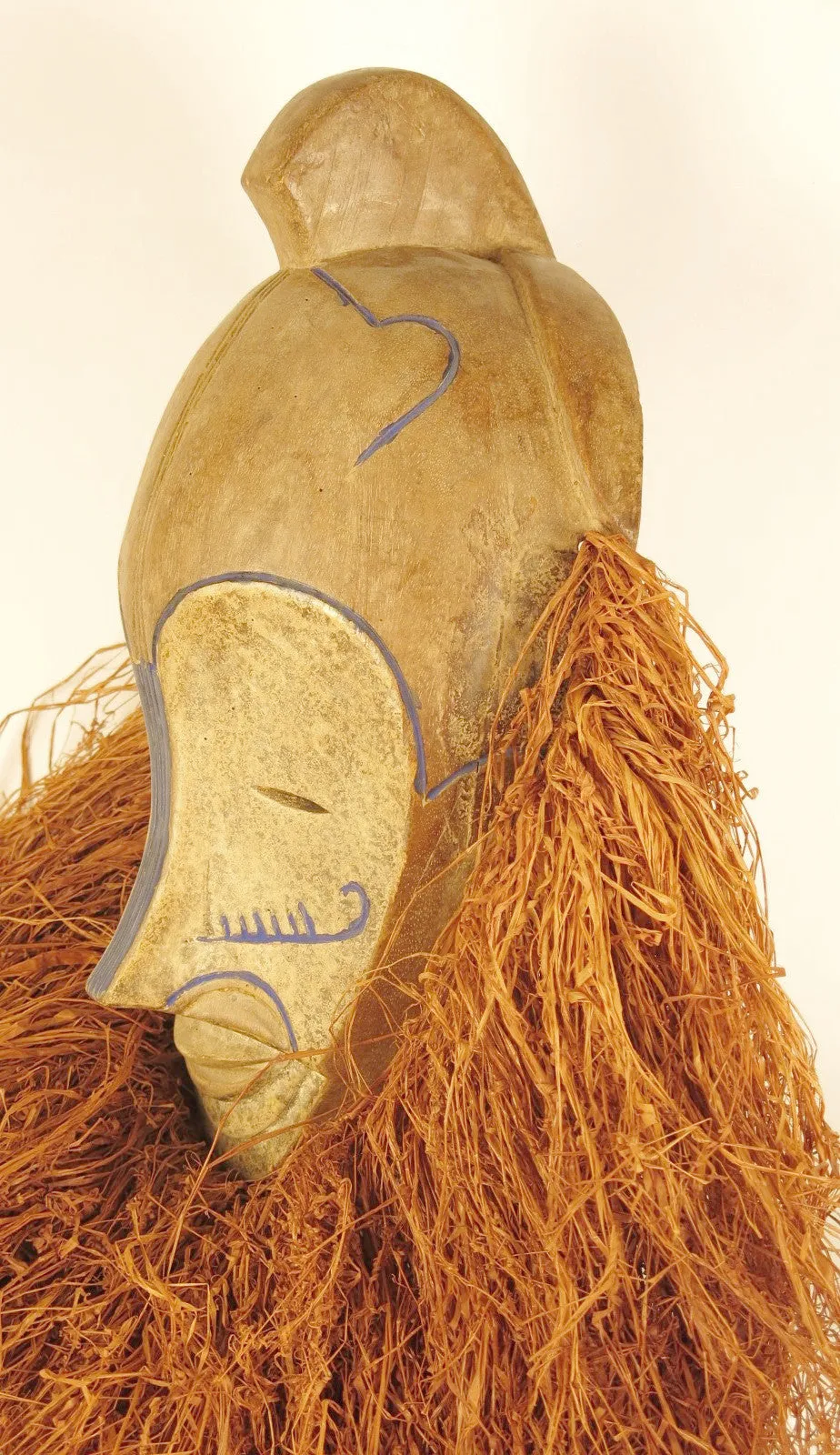 Fang Ngil Mask of Blue Scars and Vibrant Raffia