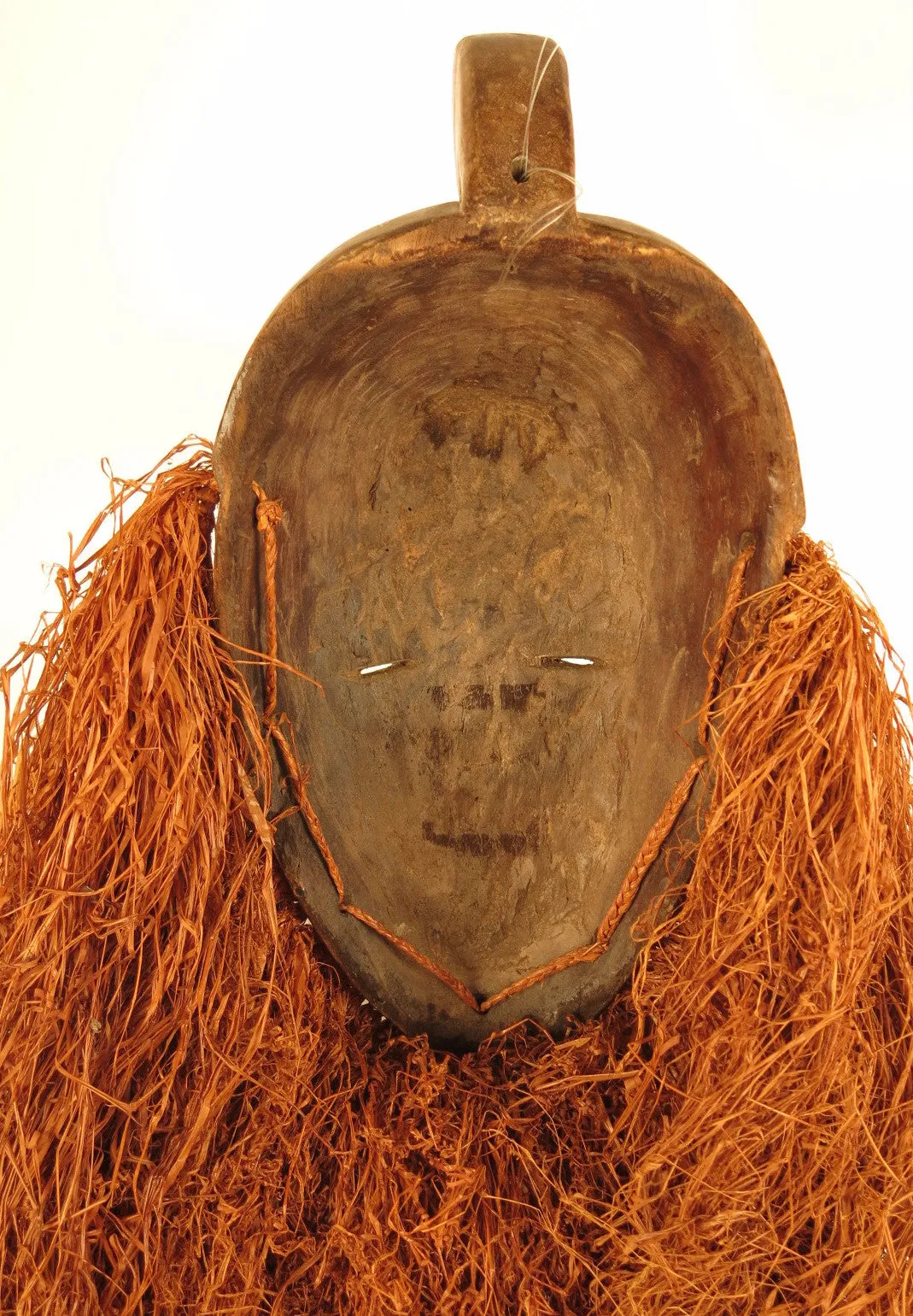 Fang Ngil Mask of Blue Scars and Vibrant Raffia