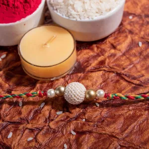 Handmade Pearl Focal Rakhi with Roli and Chawal - Unique Design for Raksha Bandhan Celebration